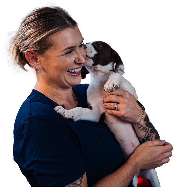 women-smiling-with-a-dog